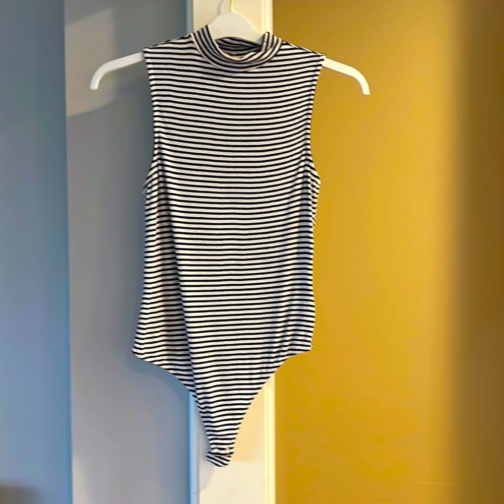 Express black and white striped bodysuit.